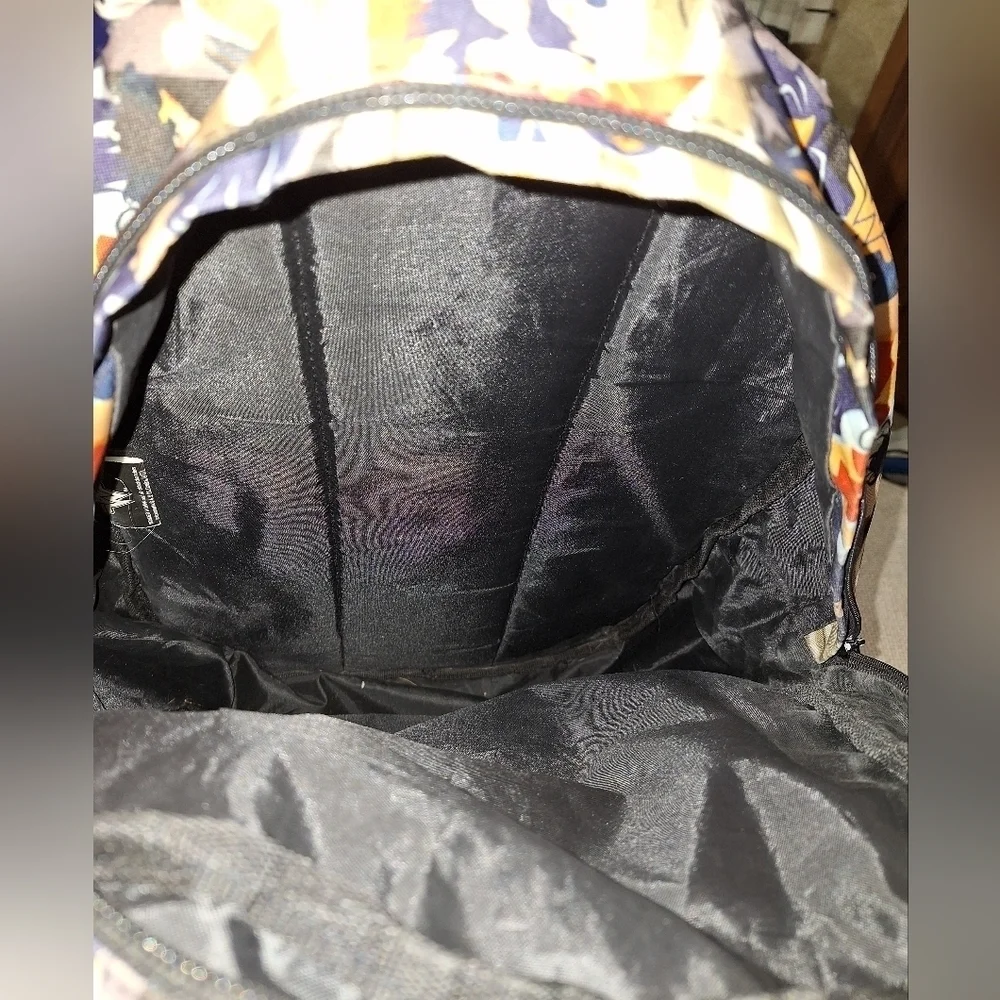 A Wonder Woman large backpack. EUC. All zippers and pockets work.